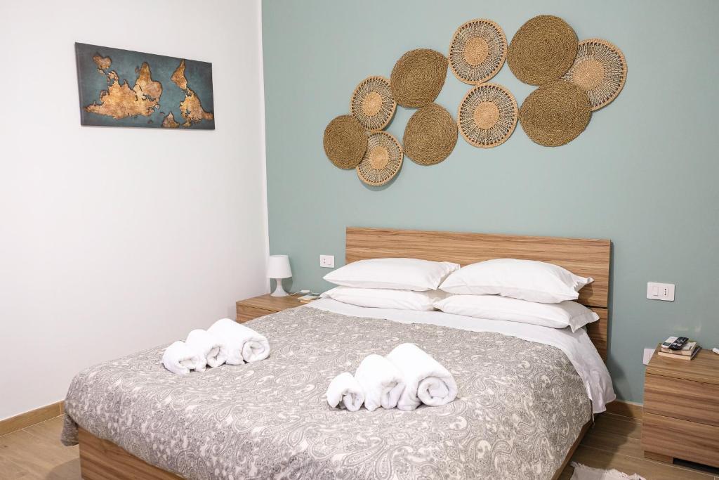 Postel nebo postele na pokoji v ubytování Home Sweet Home da Viky