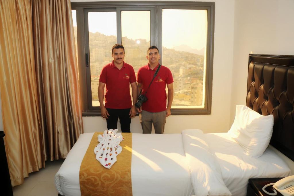 Postel nebo postele na pokoji v ubytování Sharah Mountains Hotel