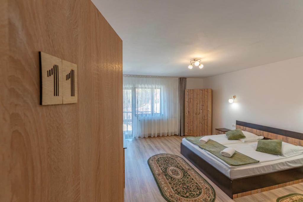Postel nebo postele na pokoji v ubytování Rare Forest Retreat