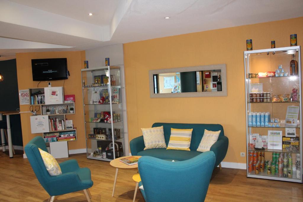 TV a/nebo společenská místnost v ubytování Aparthotel Adagio Access Nice Garibaldi
