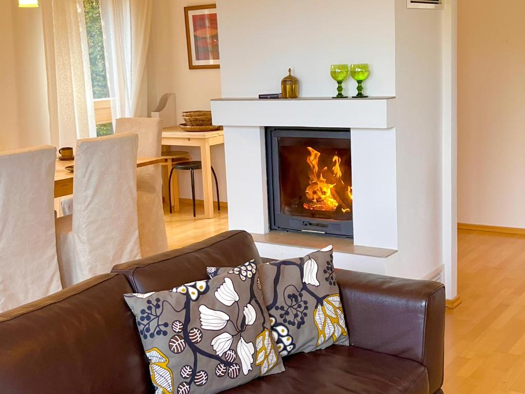 Posezení v ubytování Chalet Attersee - ganzes Ferienhaus, Seeblick, Kamin, Sauna