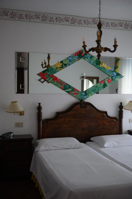 Postel nebo postele na pokoji v ubytování Agora Park Hotel