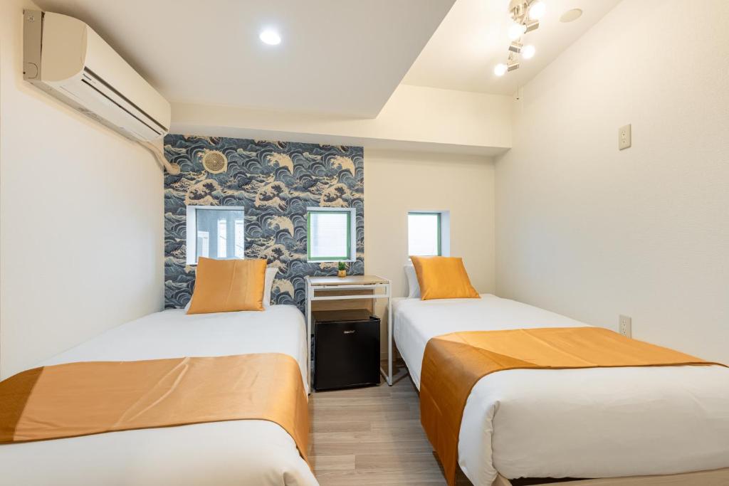 Ένα ή περισσότερα κρεβάτια σε δωμάτιο στο 東新宿1103