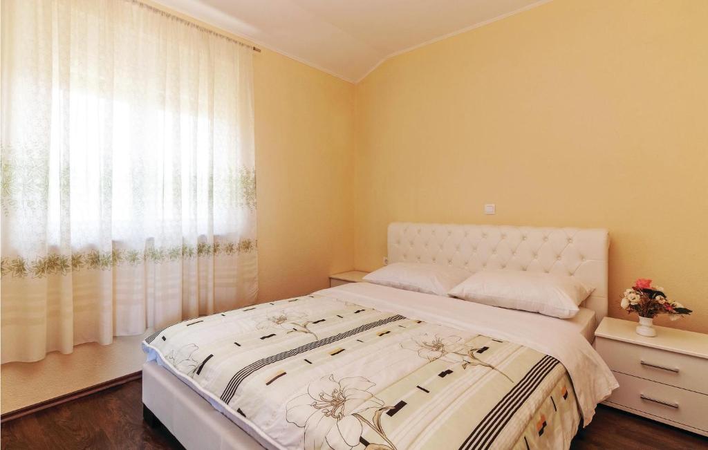 Posteľ alebo postele v izbe v ubytovaní Apartment Ribnica-Krusevo With Sea View Xii