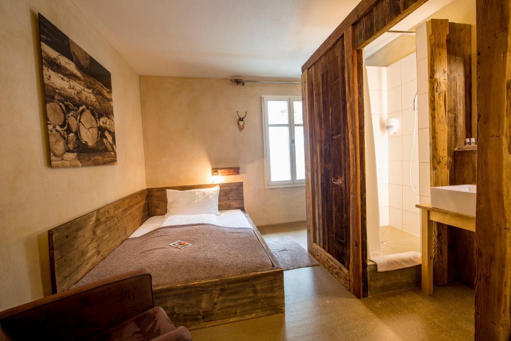 Postel nebo postele na pokoji v ubytování Hotel Wetterhorn