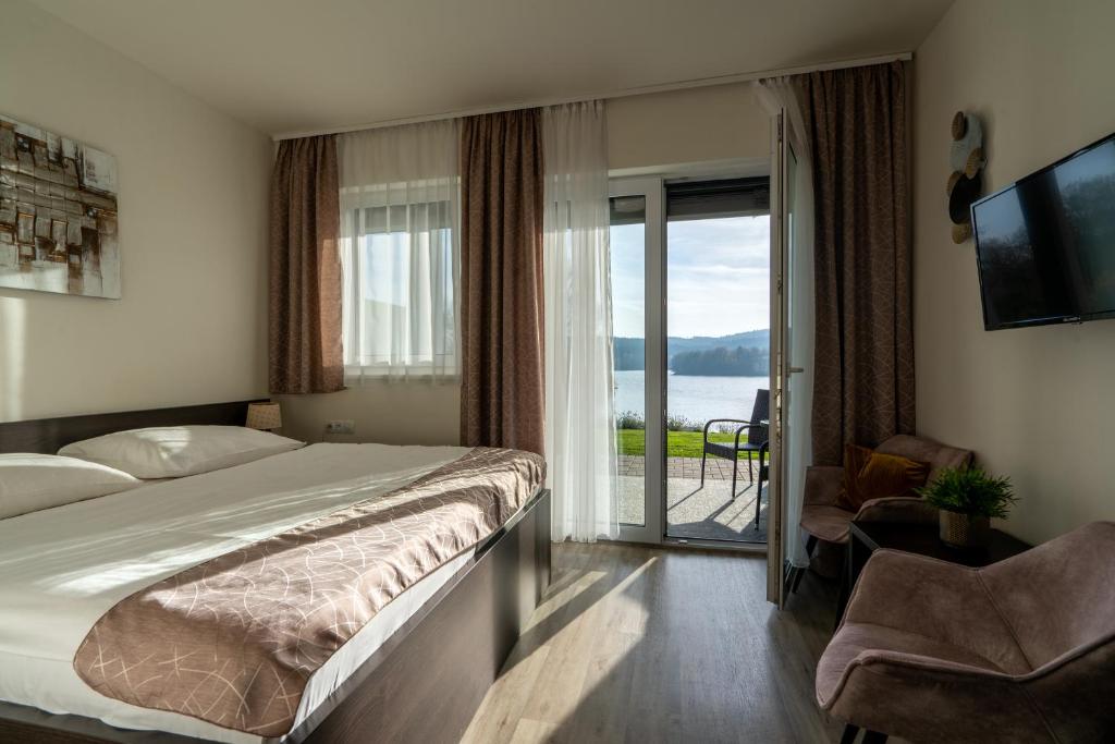 Postel nebo postele na pokoji v ubytování Rezidence Sunny Hill