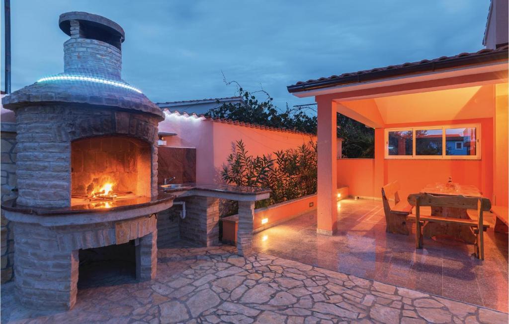 Patio lub wspólna przestrzeń na świeżym powietrzu w obiekcie Holiday Home Betiga Betiga Ii