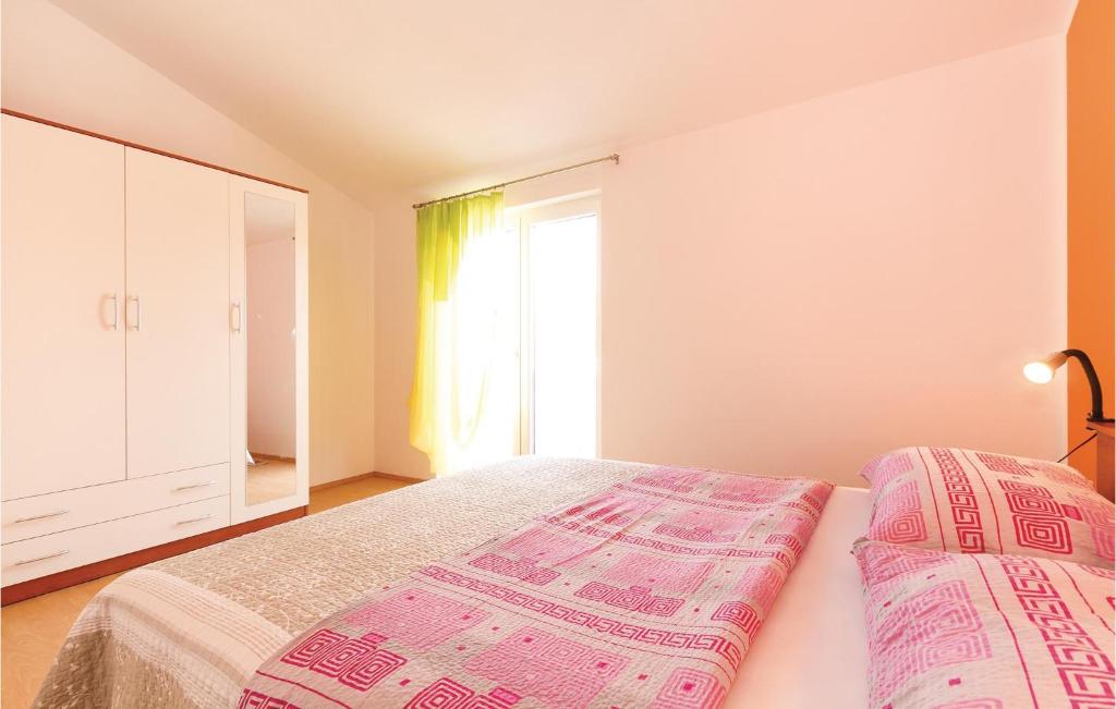 Łóżko lub łóżka w pokoju w obiekcie Holiday Home Betiga Betiga Ii
