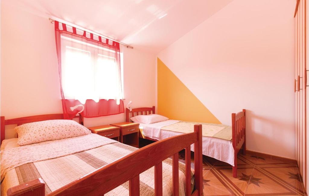 Łóżko lub łóżka w pokoju w obiekcie Holiday Home Betiga Betiga Ii