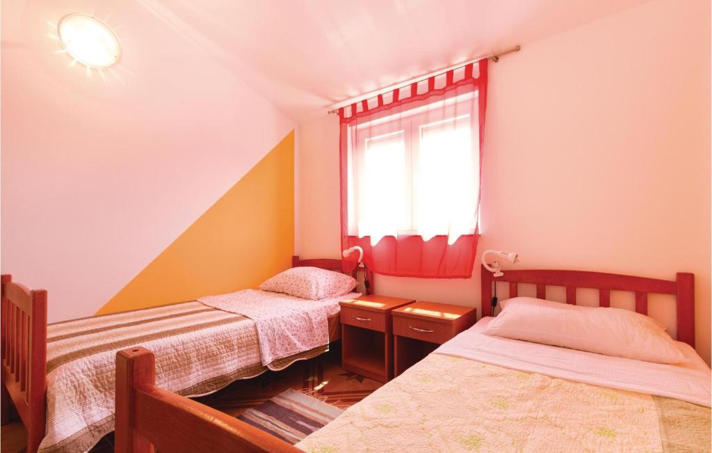 Łóżko lub łóżka w pokoju w obiekcie Holiday Home Betiga Betiga Ii