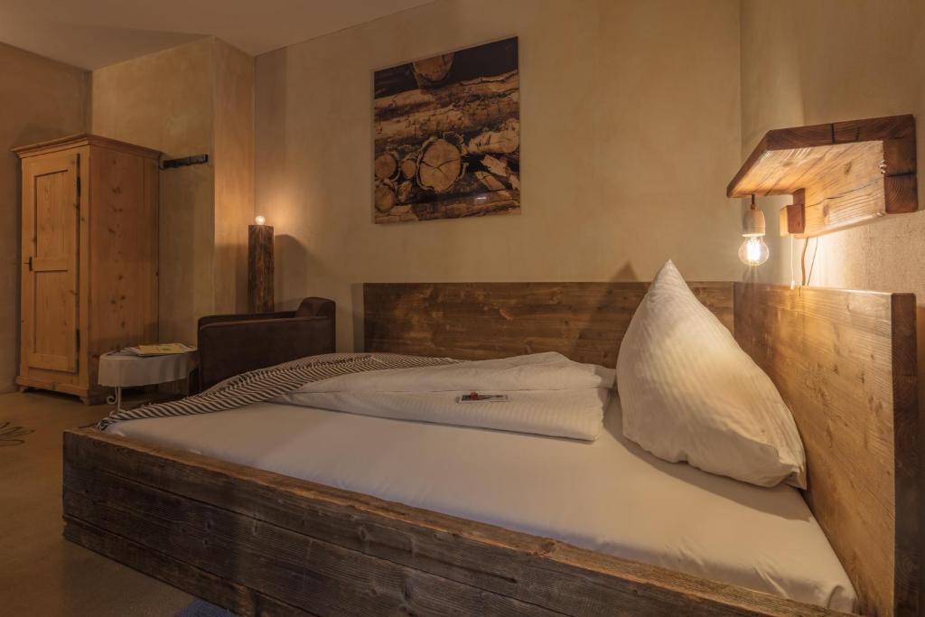 Postel nebo postele na pokoji v ubytování Hotel Wetterhorn