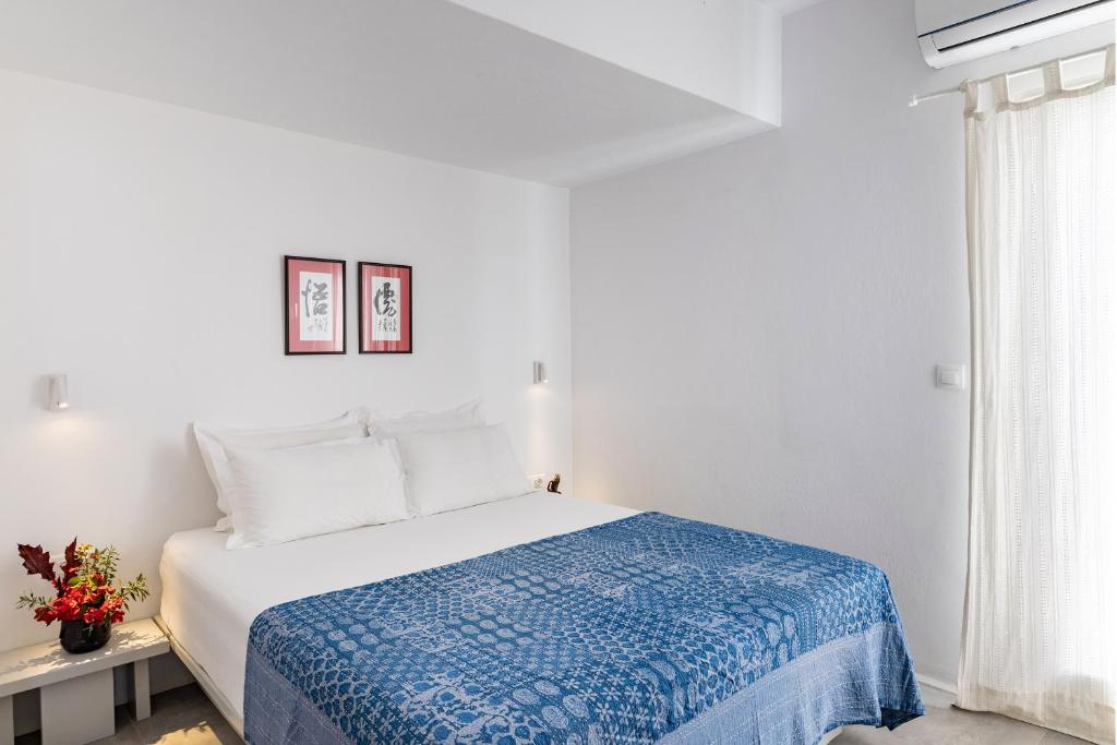 Posteľ alebo postele v izbe v ubytovaní Villa Mykonian Ode with Stunning Sunrise & Sunset Views