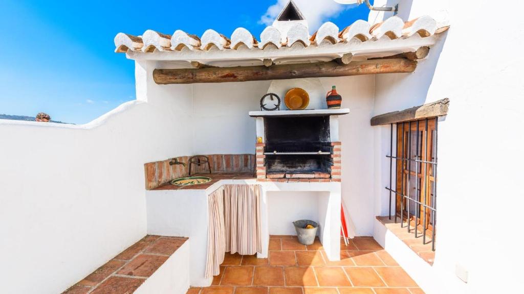 Kuchyň nebo kuchyňský kout v ubytování Villa Montilla Frigiliana by Ruralidays