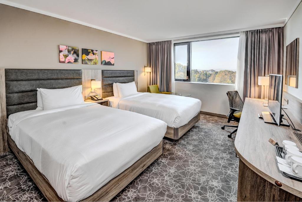 Posteľ alebo postele v izbe v ubytovaní Hilton Garden Inn Wiener Neustadt