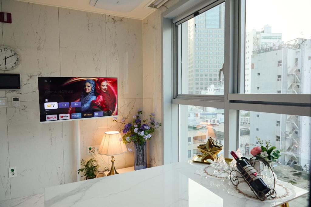 TV a/nebo společenská místnost v ubytování Rest in the City