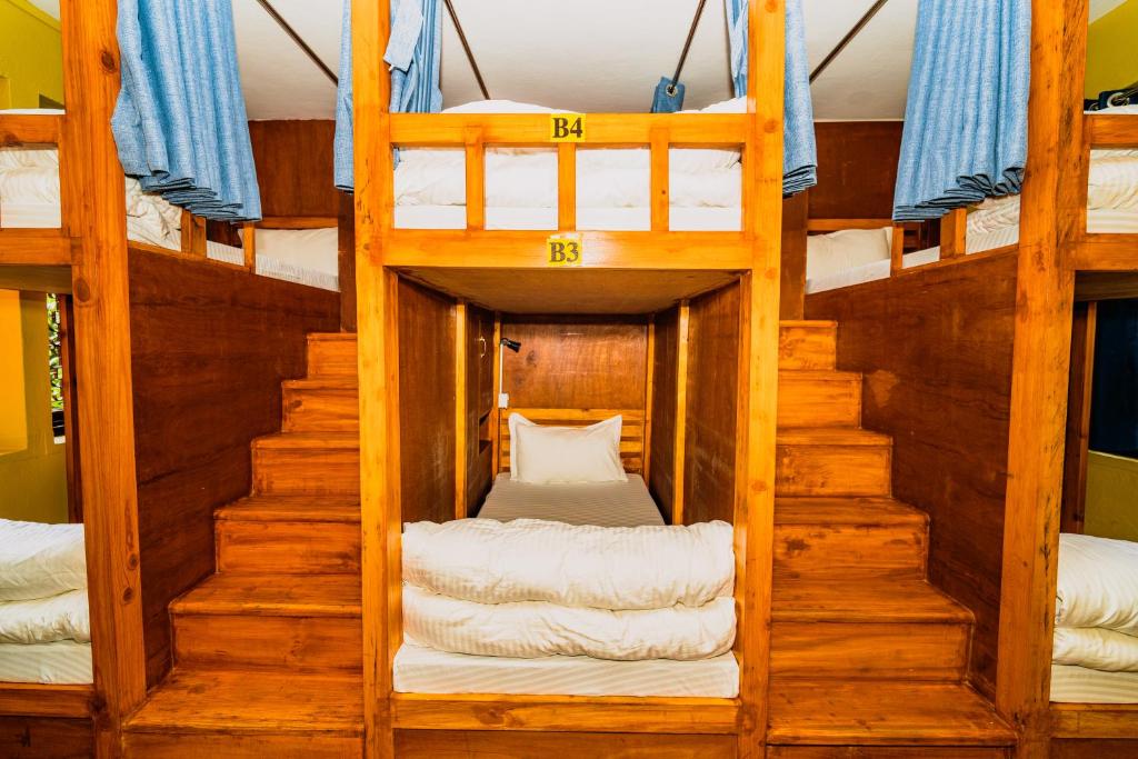 Postel nebo postele na pokoji v ubytování Thamel Heritage Hostel