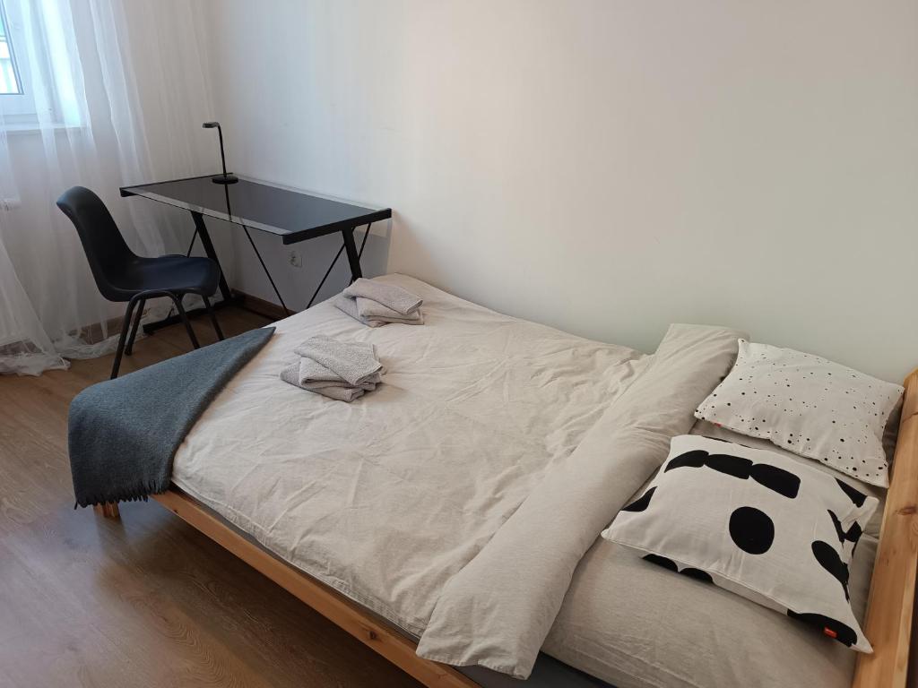 Postel nebo postele na pokoji v ubytování minimalistic