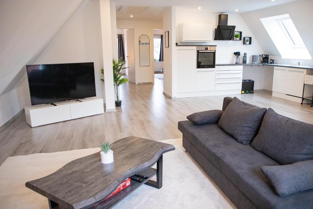TV/trung tâm giải trí tại ME LIVING Ferienwohnung Loft Lemgo Brake