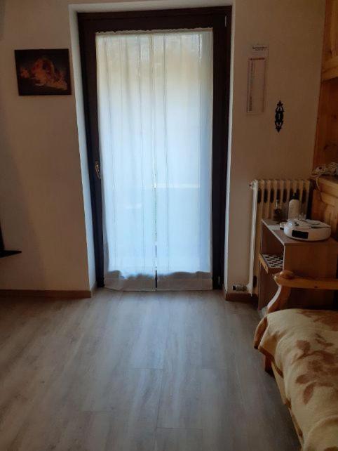 A bed or beds in a room at monolocale Sabrina