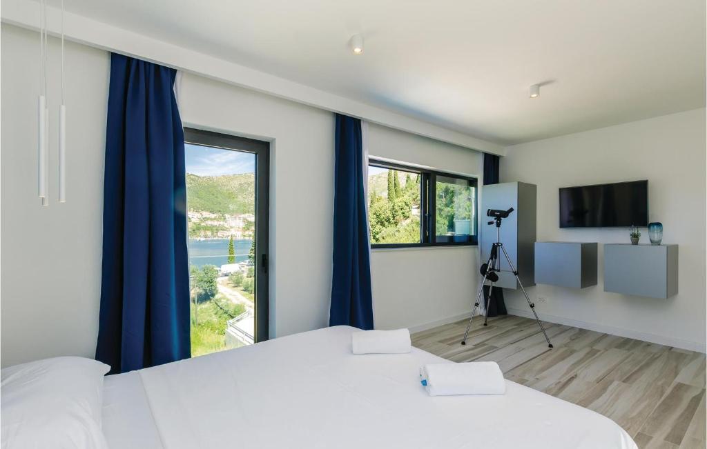 Posteľ alebo postele v izbe v ubytovaní Four-Bedroom Holiday Home In Zaton Mali