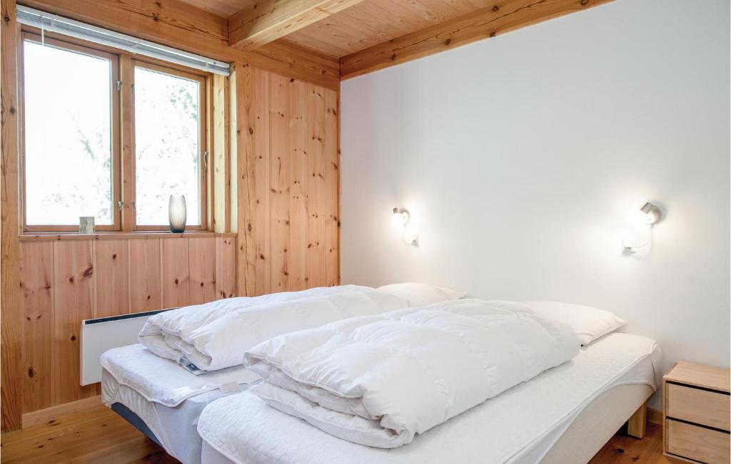 Postel nebo postele na pokoji v ubytování Holiday Home Odde Naturpark Xi