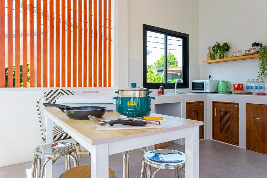 Kuchyň nebo kuchyňský kout v ubytování Vawa Guesthouse