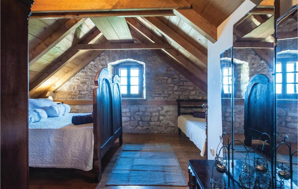 Posteľ alebo postele v izbe v ubytovaní Holiday Home With 2 Bedroom