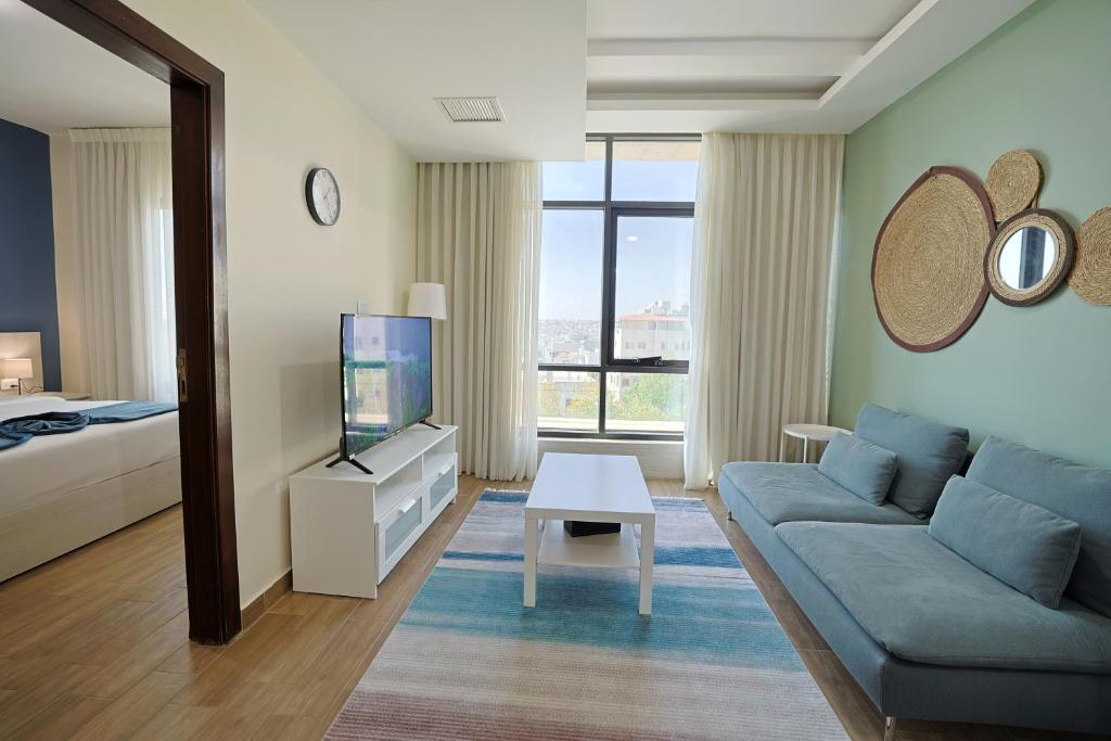 Postel nebo postele na pokoji v ubytování 46 Serviced Apartments