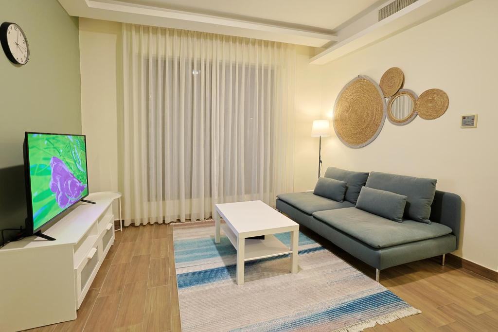 TV a/nebo společenská místnost v ubytování 46 Serviced Apartments