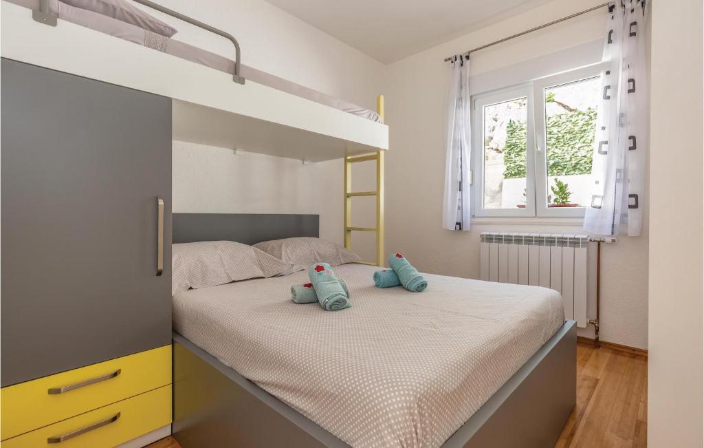 Posteľ alebo postele v izbe v ubytovaní 3 Bedroom Awesome Home In Zagvozd