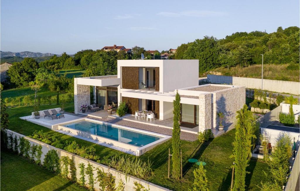 an aerial view of a house with a swimming pool at Villa Adoral in Labin