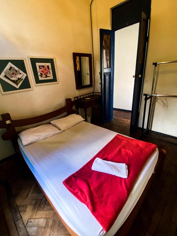 Postel nebo postele na pokoji v ubytování Pousada e Hostel Andarai