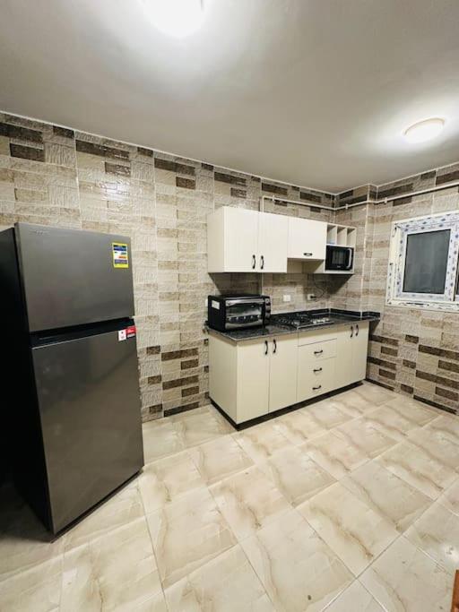 Kuchyň nebo kuchyňský kout v ubytování Elegant Ground-Floor Apt in SZ