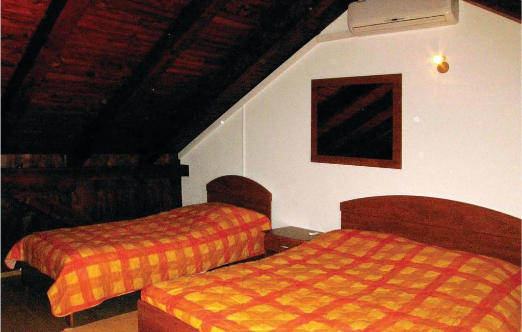 Posteľ alebo postele v izbe v ubytovaní Lovely Home In Podstrana