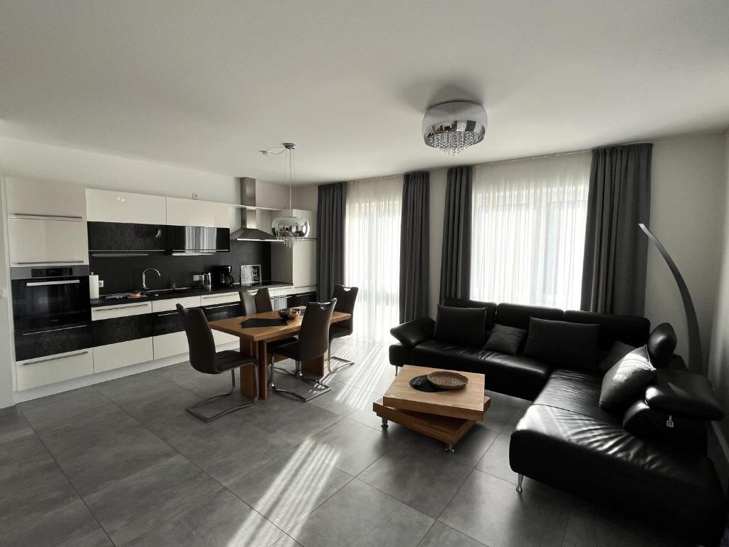 Kuchyň nebo kuchyňský kout v ubytování Apartment Deichgraf, Am Alten Deich 14 5