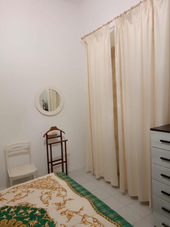 Postel nebo postele na pokoji v ubytování B&B ex Albergo Centrale ATESSA CENTRO