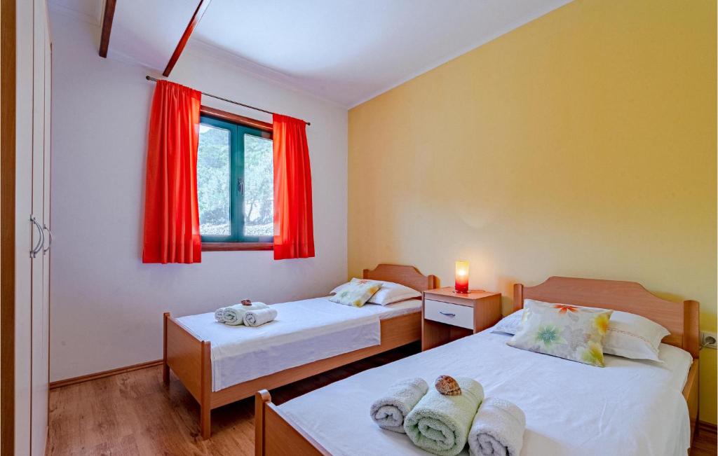 Łóżko lub łóżka w pokoju w obiekcie Apartment Crnja Luka I