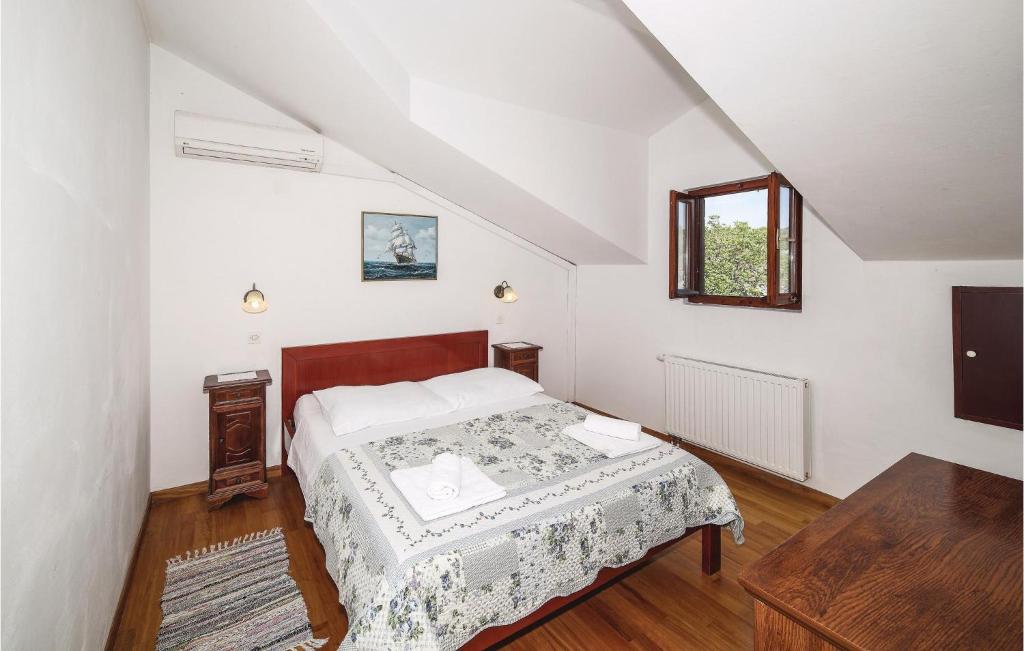 Postel nebo postele na pokoji v ubytování Holiday Home Vela Rina Iv