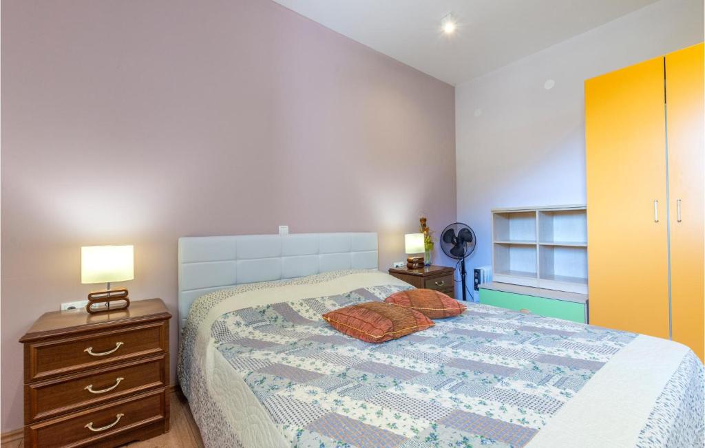 Postel nebo postele na pokoji v ubytování Holiday Home Gata Bb Iv