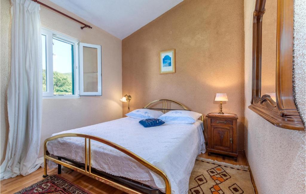 Postel nebo postele na pokoji v ubytování Holiday Home Gata Bb Iv