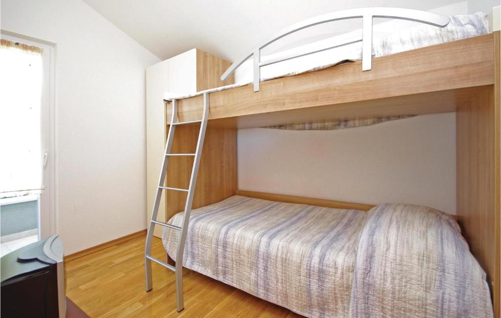 Posteľ alebo postele v izbe v ubytovaní 4 Bedroom Stunning Home In Tucepi