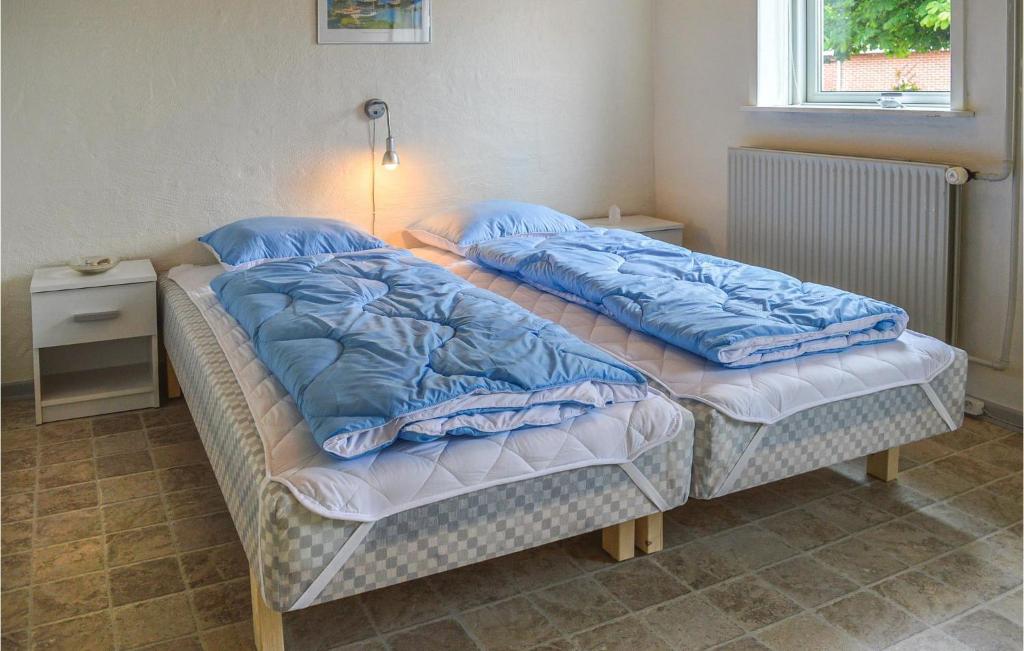 Postel nebo postele na pokoji v ubytování Holiday Home Ringkobing Ii