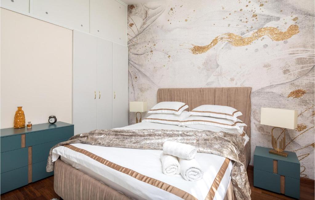 Postel nebo postele na pokoji v ubytování Holiday Home Blato Na Cetini 9