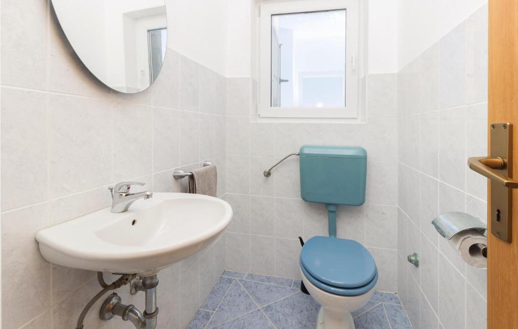 Łazienka w obiekcie Apartment Komoseva I
