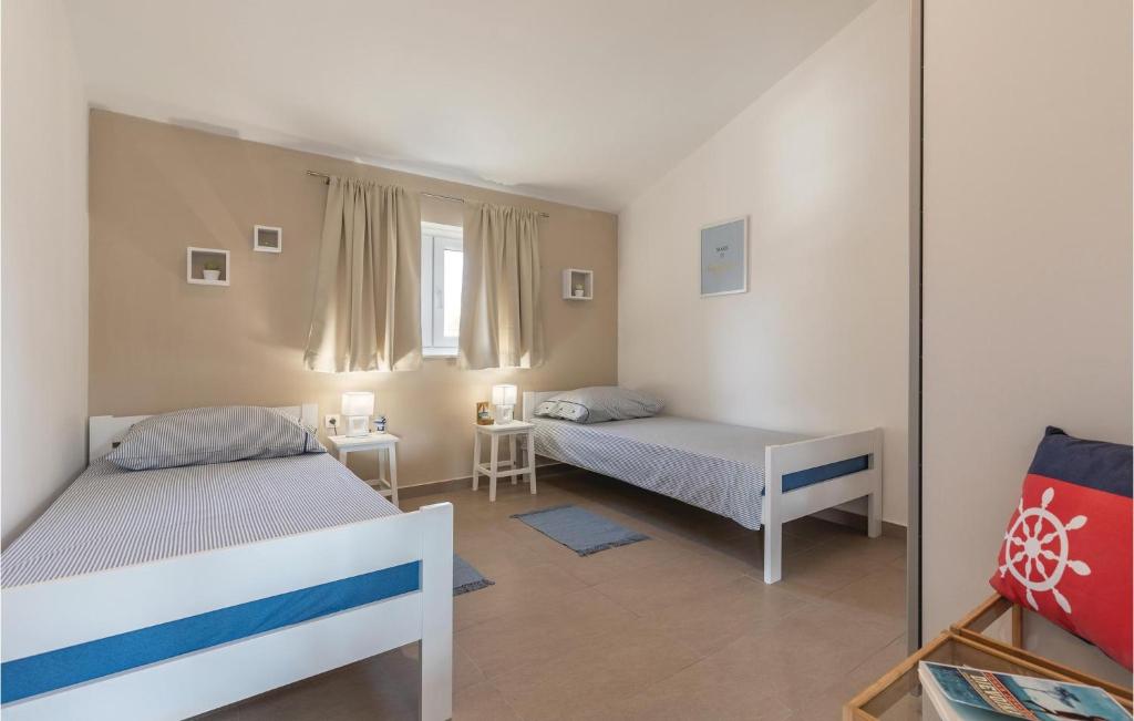 Łóżko lub łóżka w pokoju w obiekcie Holiday Home Cere Cere Ii