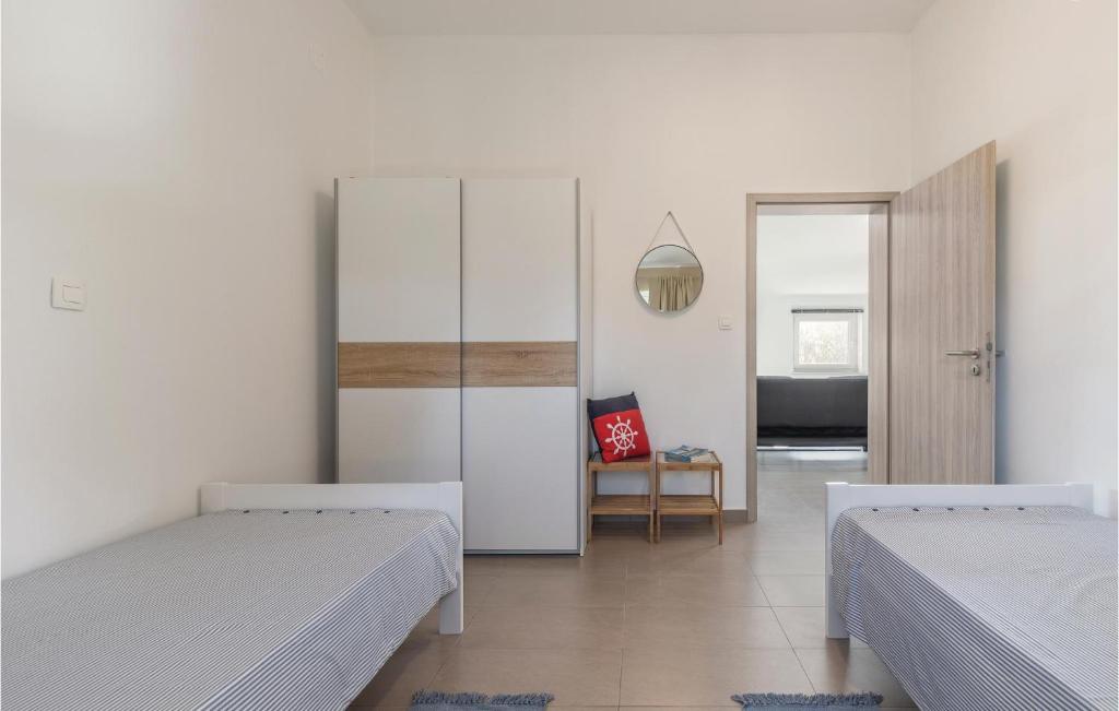 Łóżko lub łóżka w pokoju w obiekcie Holiday Home Cere Cere Ii