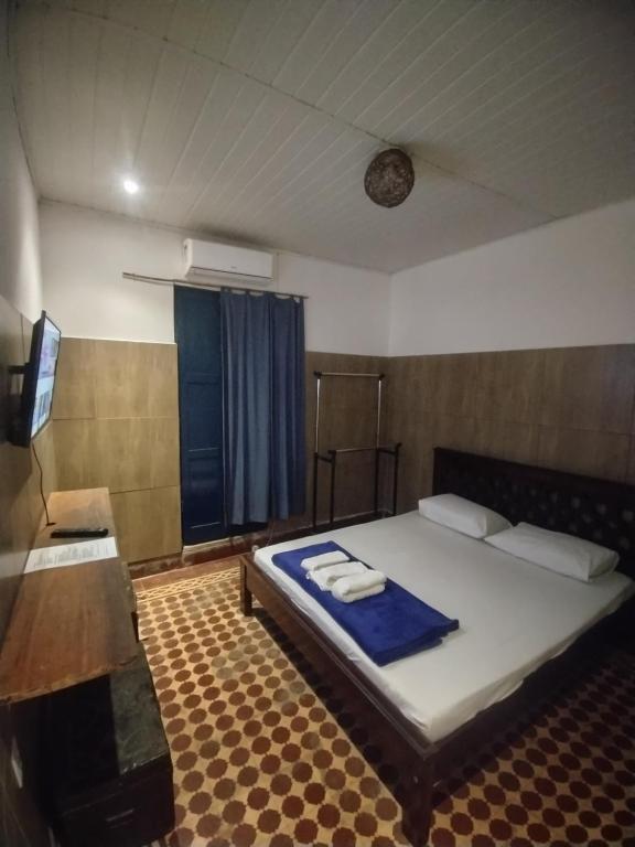 Postel nebo postele na pokoji v ubytování Pousada e Hostel Andarai
