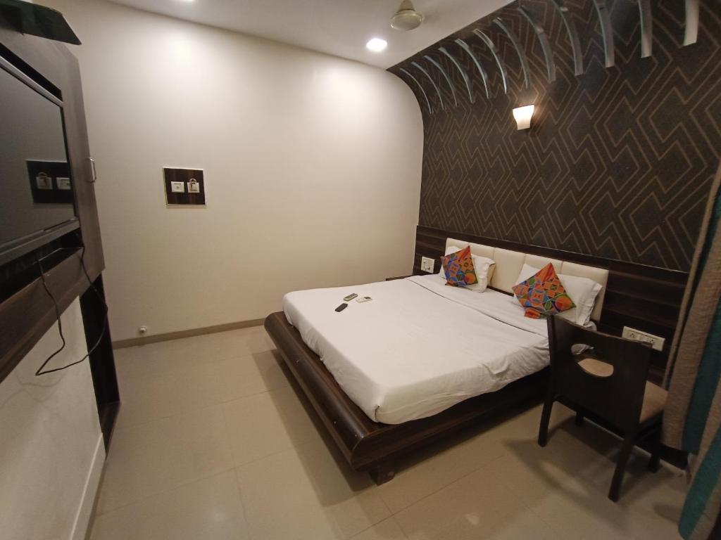 Postel nebo postele na pokoji v ubytování Hotel Airport-intl airport Near to Mumbai Airport & BKC US Consulate