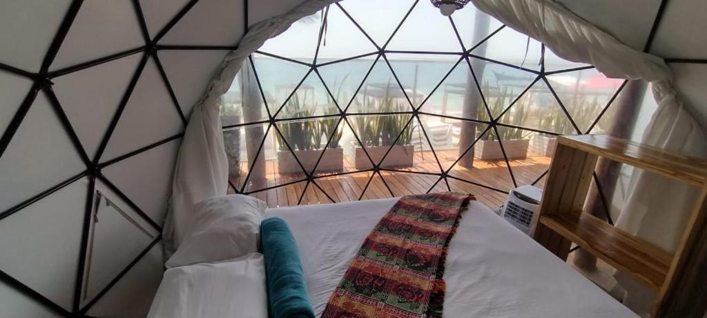 Postel nebo postele na pokoji v ubytování La Cabaña Glamping Geronimo