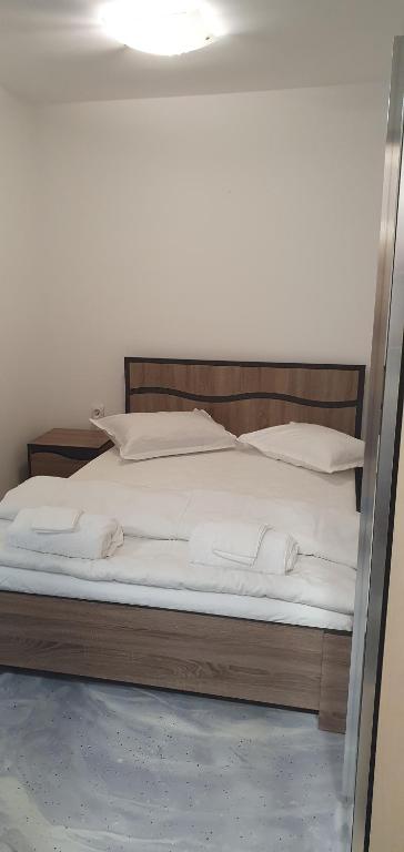 Postel nebo postele na pokoji v ubytování Casa Muresan
